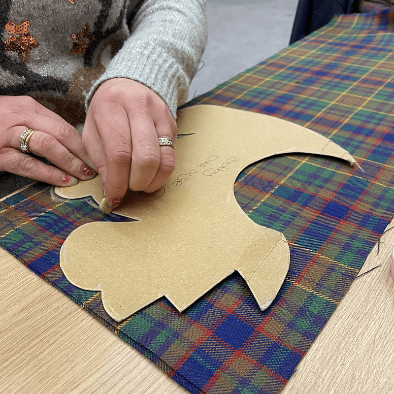 HSBC Volunteer cutting out Scotty Dogs HSBC Volunteer cutting out Scotty Dogs